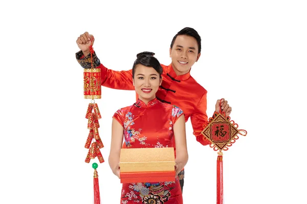 Young Asian Couple Showing Tet Decorations Isolated White — Stock Photo, Image