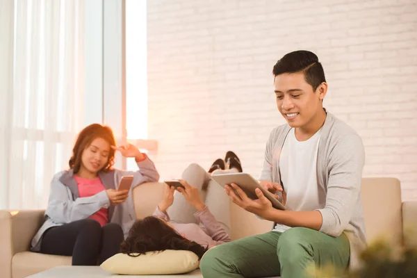 Vietnamese Young Man Using App Tablet Computer His Friend Lounging — Stock Photo, Image