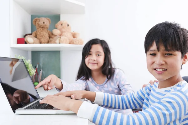 Mixed Race Cheerful Siblings Working Laptop Together — Stock Photo, Image