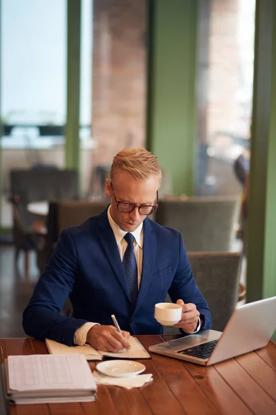 Portrait Young Businessman Having Cup Espresso Writing Plans Day — Stock Photo, Image