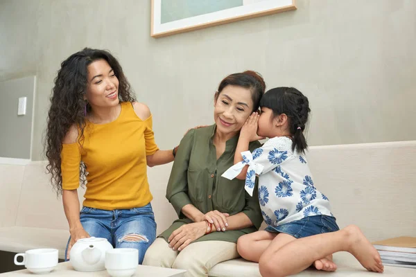 Adorable Vietnamese Girl Telling Secret Her Grandmother — Stock Photo, Image