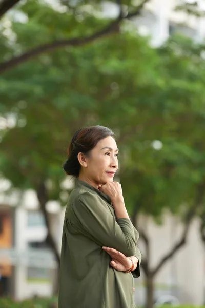 Portrait Pensive Pretty Asian Woman Standing Outdoors — Stok Foto