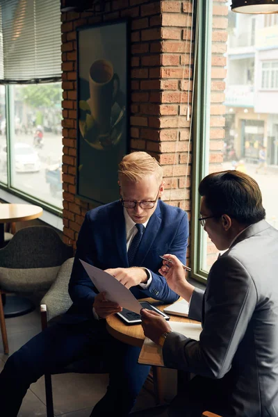 Coworkers Discussing Business Report Meeting Cafe — Stock Photo, Image