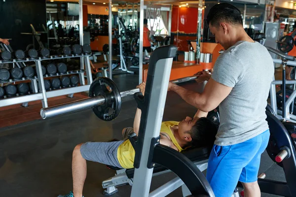 Gym Worker Helping Sportsman Barbell Lifting — Stock Photo, Image