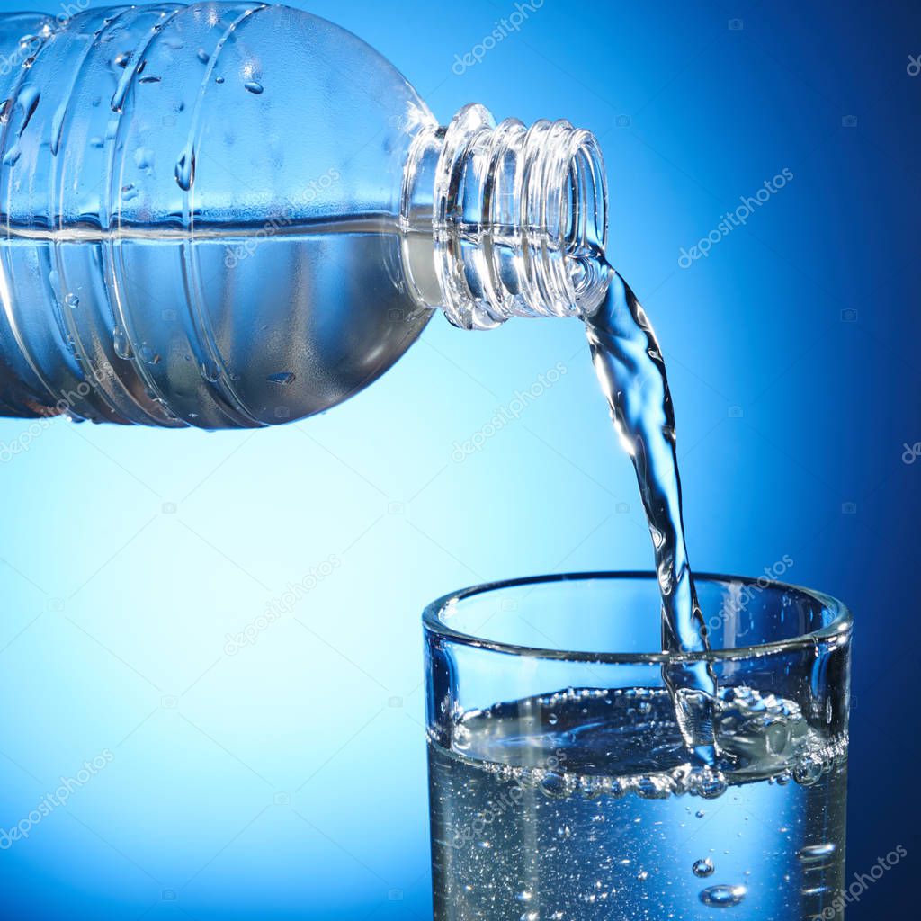 Fresh Pure Water Pouring Glass Out Plastic Bottle — Stock