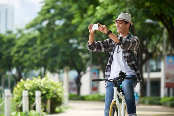 Smiling Young Vietnamese Man Bicycle Taking Photos His Phone — Stock Photo, Image