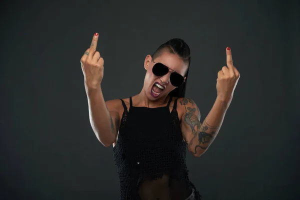 Rebellious Young Woman Sunglasses Showing Middle Fingers — Stock Photo, Image