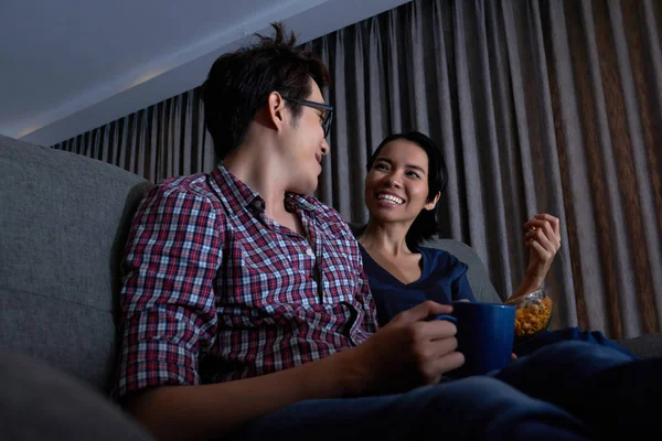 Cheerful Vietnamese Couple Enjoying Watching Film Night — Stock Photo, Image