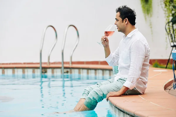 Pensive Indian Man Jeans White Shirt Sitting Edge Swimming Pool — Stock Photo, Image