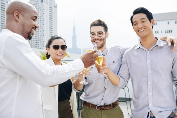 Hugging Happy Multi Ethnic Coworkers Drinking Champagne Celebrating Finishing Big — Stock Photo, Image