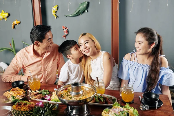 Little Boy Kissing His Mother Cheek Family Dinner Asian Cuisine — 图库照片