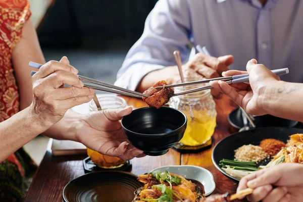 Two People Holding One Piece Deep Fried Chicken Chopsticks Trying — 图库照片