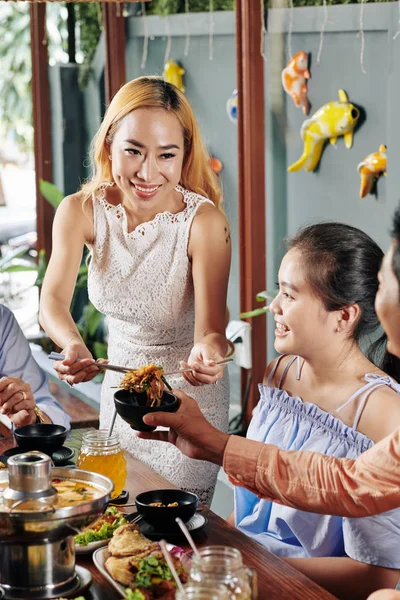 Positive Pretty Vietnamese Woman Putting Spicy Noodle Bowl Hand Her — 图库照片