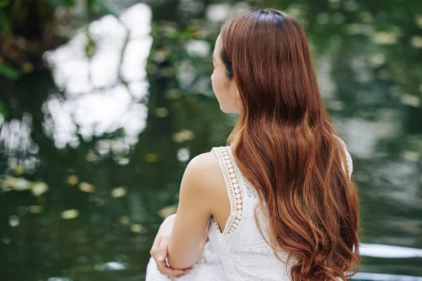 Pensive Young Woman Beautiful Long Hair Sitting Small Pond Park — Stock Photo, Image