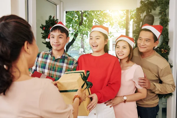 Happy Vietnamese Family Visiting Grandmother Christmas Giving Her Presents — 스톡 사진