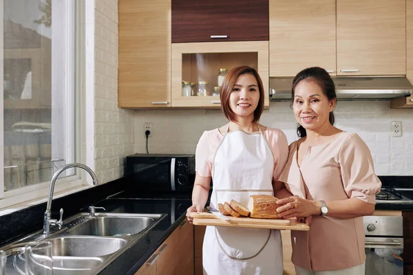 Cheerful Pretty Young Vietnamese Woman Her Senior Mother Holding Wooden — 스톡 사진