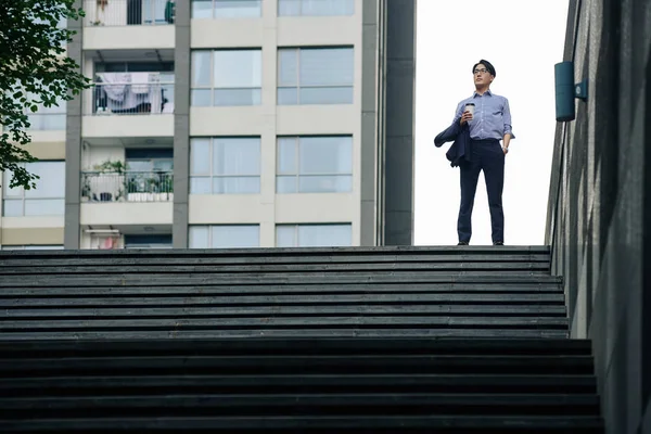 Confident Ambitious Asian Businessman Standing Top Stairs Cup Coffee Jacket — Stock Photo, Image