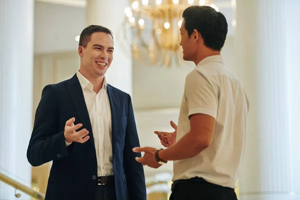 Smiling Handsome Young Businessman Talking Colleague Discussing New Prospective Project — Stock Photo, Image