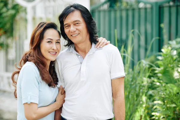 Positive Asian Middle Aged Couple Hugging Posing Street Together — Stock Photo, Image