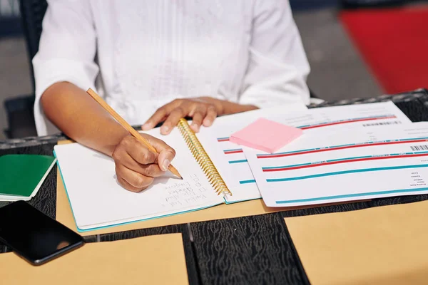 Female Entrepreneur Sitting Table Boarding Passes Taking Notes Notebook Planning — Stock Photo, Image