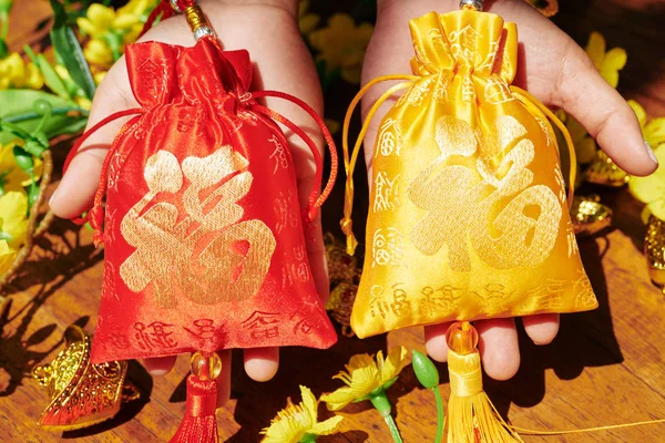 Female Hands Showing Fabric Bags Best Wishes Embroidery Lunar New — 스톡 사진