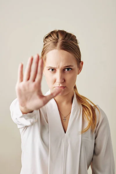 Frowning Young Pretty Businesswoman Making Stop Gesture Express Denial — Stock Photo, Image