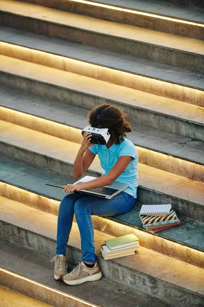 Vertical High Angle Shot Unrecognizable Schoolgirl Using Headset Laptop Books — Stock Photo, Image