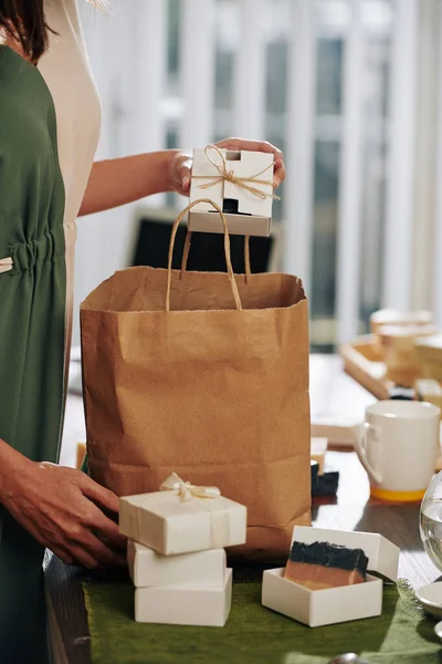 Woman Putting Packed Handmade Soap Bars Paper Bag Her Client — Stock Photo, Image