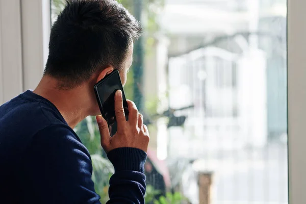 Young Man Looking Window Talking Phone Friend Colleague — Stock Photo, Image