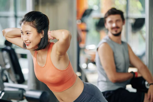 Smiling Pretty Young Vietnamese Woman Doing Exercise Hyperextension Machine — Stock Photo, Image