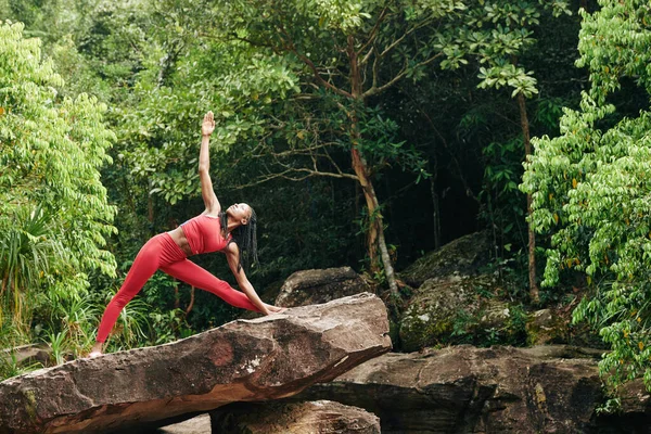 Pretty Fit Black Woman Doing Triangle Pose Big Rock Forest — Stock Photo, Image