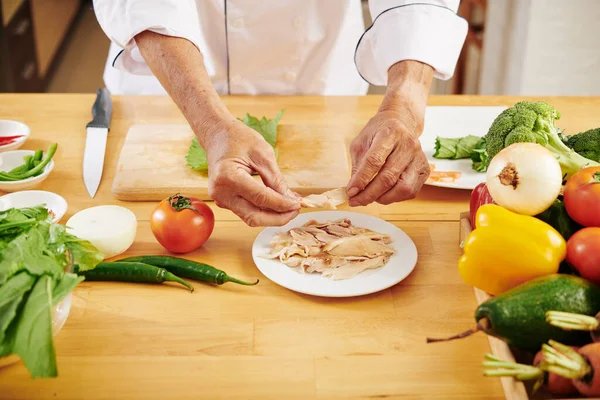 Man Wrapping Boiled Chicken Fillet Lettuce Leaves — Stock Photo, Image