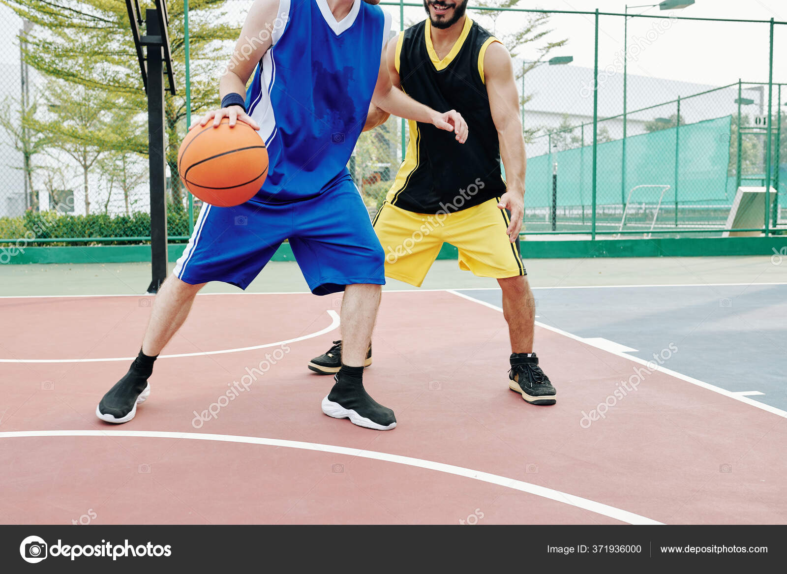 Two Sweaty Street Basketball Players Having Training Outdoor Stock Photo by ©DragonImages 371936000