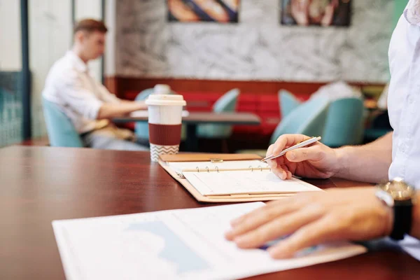 Close Image Businessman Analyzing Financial Chart Taking Notes Planner — Stock Photo, Image