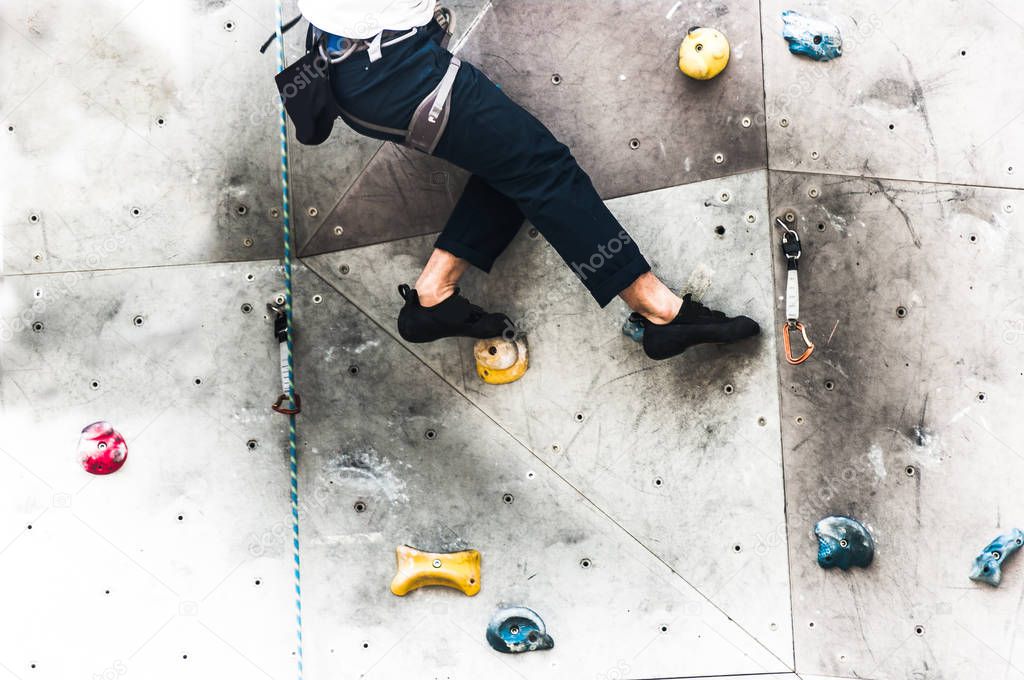 Close-up of asian male Climbing