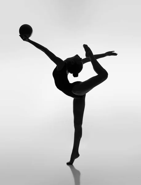 Gymnast Posing Ball Backlight — Stock Photo, Image