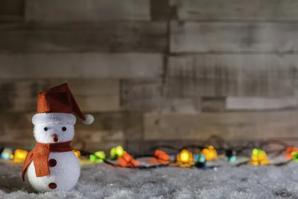 Muñeca de Santa primer plano con luces de Navidad — Foto de Stock