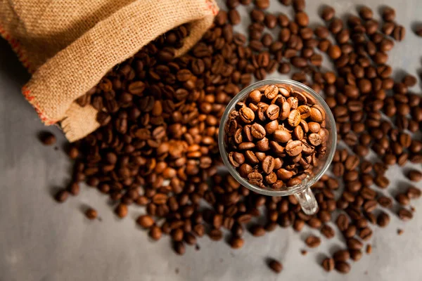 Coffee Beans Glass Cup Coffee Beans Coming Out Sack Lying — Stock Photo, Image