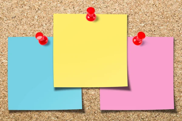 Cork board with three sticky notes