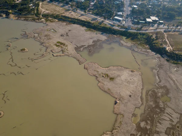 Aerial shot. Climate change and drought land, Global warming concept, drought cracked river banks landscape, dry reservoir