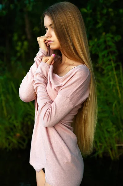 Femininity girl teenager with luxurious long hair — Stock Photo, Image
