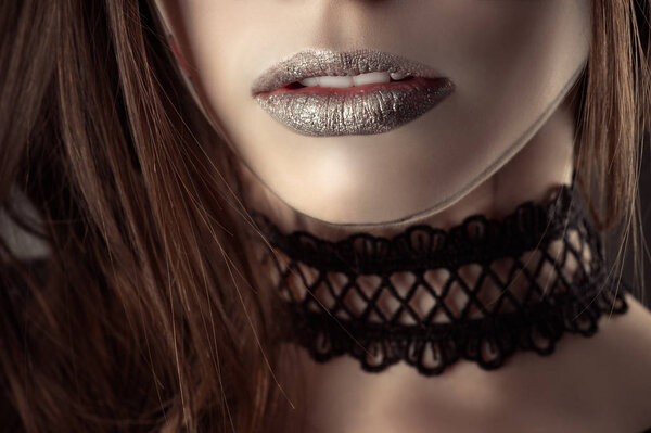 Beautiful lips young girl with fashion choker closeup