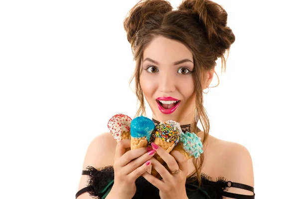 Happy young brunette with ice cream in hands — Stock Photo, Image