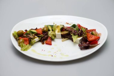 salad on a plate with vegetable