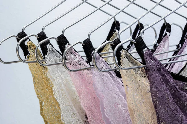 Lace panties on metal hanger. — Stock Photo, Image