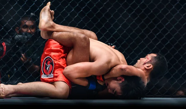 Dejdamrong Sor Amnuaysirichoke of Thailand and Joshua Pacio of Philippines in One Championship "One : Warrior Kingdom" Stock Image