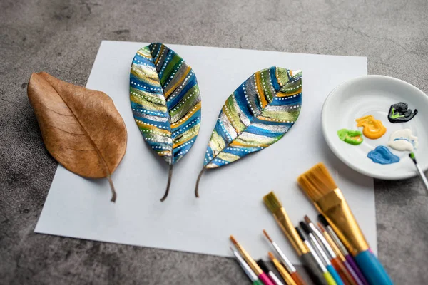 Painting leaves colors, crafts and art therapy for adults and kids. Classic Leaf painting art. 2020 isolation project.