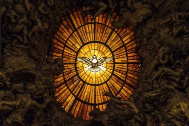 Dove surrounded by angels - composition in the Department of St. Peter. Vatican. Rome. Italy.