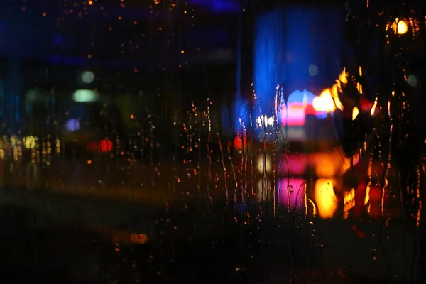 Foto stock - borrão no vidro da chuva — Fotografia de Stock