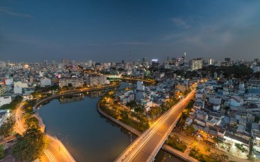 Lisanslı yüksek kaliteli ücretsiz stok görüntü hava görünümünü Ho Chi Minh city, Vietnam. Ho Chi Minh City, Vietnam için kentsel gelişim aşağı nehir ışık boyunca güzellik gökdelenler pürüzsüz.